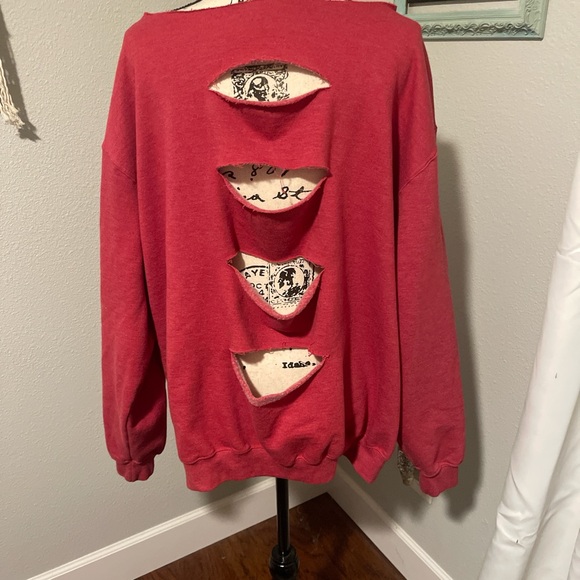 Red Sweatshirt with Skull and Feather Graphic - Picture 3 of 3